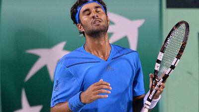 India's Yuki Bhambri reacts during his match against Filip Krajinovic at the Davis Cup on Sunday night. Bhambri lost when the match was resumed following a rain suspension on Monday. Manjunath Kiran / AFP / September 14, 2014