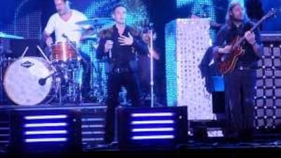 The Killers perform at the Lollapalooza festival in Chicago.