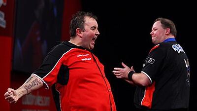 Phil Taylor, left, and Raymond van Barneveld could be visiting Dubai as the Professional Darts Corporation looks to take the game of darts to new markets around the world.