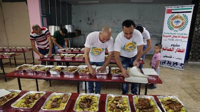 Human Appeal International offers meals to people at the Al Aqsa mosque grounds.