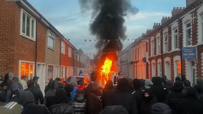 Vehicles set on fire by protesters in Belfast, as disorder flared in response to Monday night's stabbing attack in the city. PA