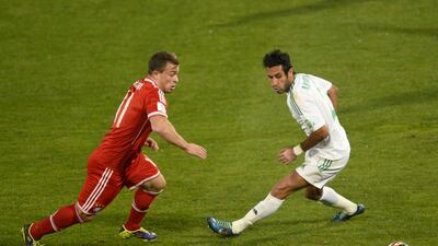 Bayern Munich's Swiss midfielder Xherdan Shaqiri fights for the ball against Raja Casablanca defender Adil Karrouchy during their 2013 Fifa Club World Cup final . AFP