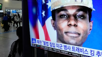 An image of Travis King appears during a news programme in South Korea. AP