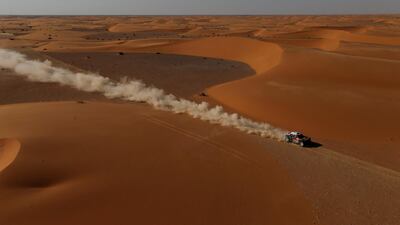 Drivers cross sand dunes in stage 9 of the Dakar Rally in Saudi Arabia. Reuters
