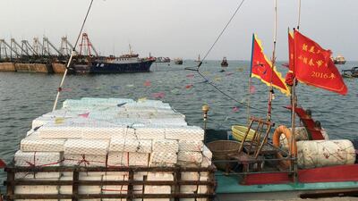 Fishing boats at a harbour in Baimajing, Hainan province, April 7, 2016. Megha Rajagopalan/Reuters