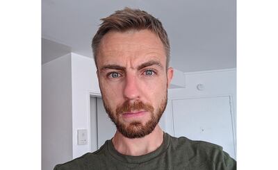 Jonathan Adeline says Tier e-scooters make his daily commute to work in Jumeirah Lakes Towers cost-effective. Photo: Tier Mobility