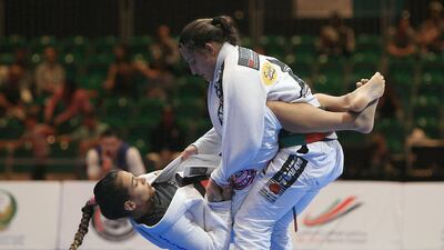 Beatriz Mesquita, left, says she is impressed with the growth she has witnessed every year participating in the Abu Dhabi World Professional Jiu-Jitsu Championships. Ravindranath K / The National