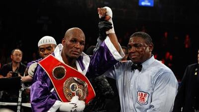 Referee Earl Brown raises Bernard Hopkins' hand after his IBF title win over Tavoris Cloud.