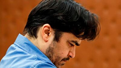 Ruhollah Zam speaking during his trial at Iran's Revolutionary Court in Tehran. AFP