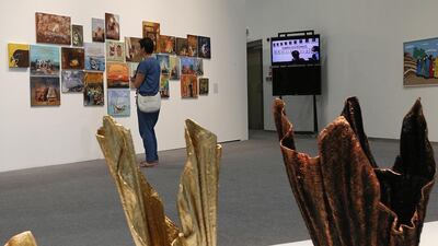 Youth detention inmates have added their creative works to those of pupils at Manarat Al Saadiyat. Ravindranath K / The National