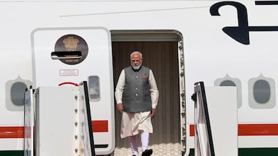 India's Prime Minister Narendra Modi disembarks from the plane upon his arrival at Ben Gurion Airport near Tel Aviv on February 25, 2026. AFP