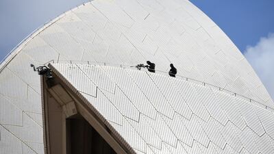 Police snipers are seen atop the Sydney Opera House. Reuters