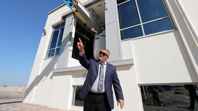 CEO of Unitsky String Technologies in the UAE, Oleg Zaretskiy, demonstrates how the system works at the Sharjah Research, Technology and Innovation Park.