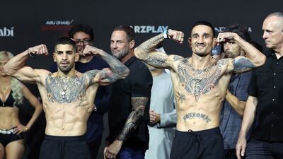 UFC featherweight champion Ilia Topuria and Max Holloway face off ahead of their title fight during the ceremonial weigh-in at UFC 308. Etihad Arena, Yas Island, Abu Dhabi. Chris Whiteoak / The National