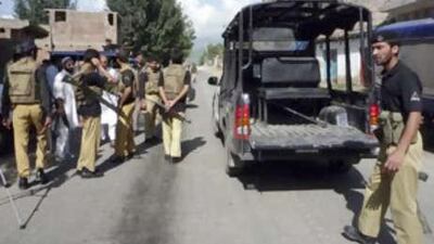 Pakistan police officers gather near the site of a bomb explosion in Kabal Aligrama, Swat Valley, Wednesday, Aug 6, 2008. Pakistani forces continue to clash with militants throughout the valley.
