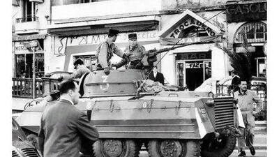 Armoured cars patrol the streets of Algiers in 1962 to prevent the occurence of violent outbreaks and incidents due to the upcoming declaration of a cease-fire in Algeria.