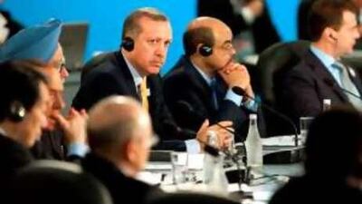 The Turkish prime minister, Recep Tayyip Erdogan, centre, attending the opening plenary session at the G20 Summit in Toronto, Canada.