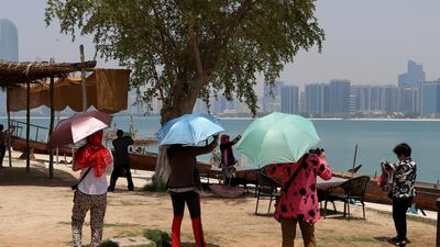 Visitors at the Heritage Village Abu Dhabi. Tourism experienced extremely healthy growth last year. Ravindranath K / The National