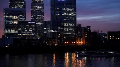The Canary Wharf business district at dusk in London. The UK capital has retained its top slot as a global financial centre. Toby Melville/Reuters