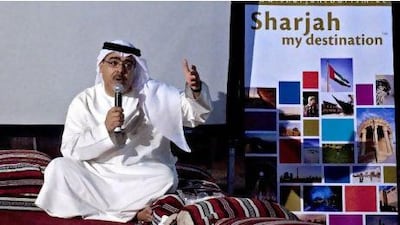 The UAE writer, poet and researcher Abdulaziz AlMusallam tells stories and fairy tales to those attending the World Tourism Day event and dinner at the Sharjah Tourism Desert Camp.