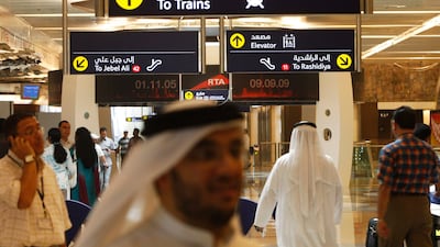 Passengers at the Union Dubai Metro station, shortly after the network opened. Stephen Lock / The National