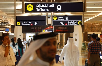 The English language is widely used in the UAE, as demonstrated by Dubai Metro signs in Arabic and English. The National