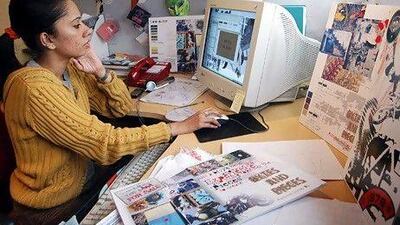 A fashion designer at work in Bangalore. Indian women are enjoying increasing opportunities in the workplace and the trend is set to subtantially benefit the country's economy. AFP