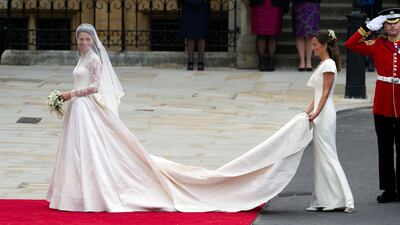 Kate Middleton at Westminster Abbey with sister Pippa Middleton. Her dress was designed by Sarah Burton of Alexander McQueen