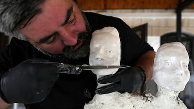 Omar Sartawi, a Jordanian chef, recreates an ancient statue found in Jordan using a famous local product - Jameed (dried goat's milk used in the country's national dish), at his workshop in Amman, Jordan. REUTERS