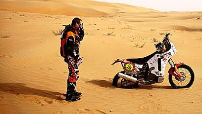 Motocross rider Giovanni Ronzoni is overcome with emotion as he realises he will not be able to complete the third stage of the Abu Dhabi Desert Challenge in the Empty Quarter.