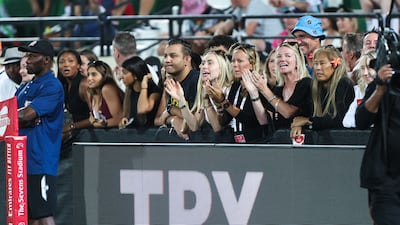 Supporters look on during the Gulf Under-19 Boys final between DESS College and Dubai College at the Emirates Dubai Sevens. Victor Besa / The National