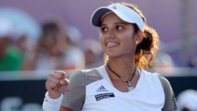 Sania Mirza celebrates after winning her semi-final against Magdalena Rybarikova.