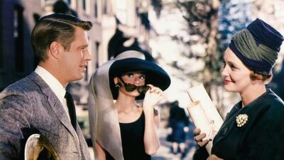 George Peppard, left, Audrey Hepburn and Patricia Neal, right, are shown in a scene from Breakfast at Tiffany’s. Paramount Pictures / AP photo