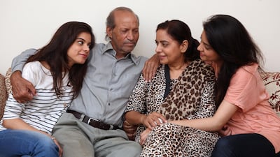 Captain Jawaid Saleem Khan with his wife Shahnaz Jawaid, and two daughtrs in their Karachi home on August 4, 2012, a day after he was released after 21 months of captivity by Somali pirates. Asim Hafeez for The National