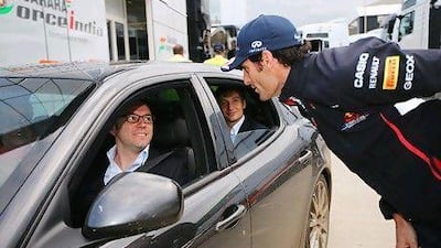 Mark Webber talks to Ferrari team principal Stefano Domenicali. There are rumours of him joining Ferrari.