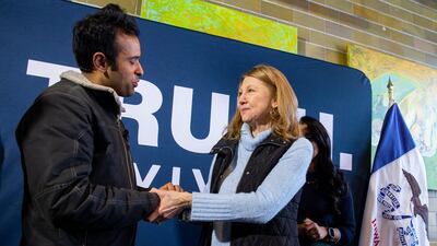 Republican presidential candidate Vivek Ramaswamy talks to a supporter in Cedar Rapids. The Gazette / AP