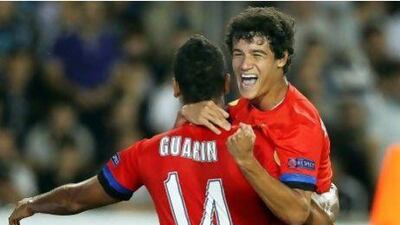 Philippe Coutinho, right, was instrumental in Inter Milan's victory in Azerbaijan on Thursday, scoring in the 3-1 win. Sergei Ilnitsky / EPA