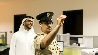 Gen Jasim Mirza from Dubai Police tries his hand at darts.