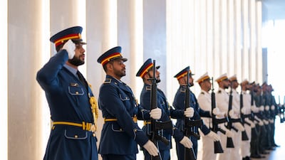 A UAE honour guard stands at attention at the Presidential Airport. Abdulla Al Bedwawi / UAE Presidential Court