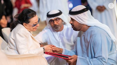 Egyptian music legend Najat Al Saghira is honoured for her contribution to Arab culture by Sheikh Theyab bin Mohammed. Photo: Abu Dhabi Media Office