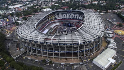(FILES) This file photo taken on June 27, 2018, shows an aerial view of the Azteca stadium in Mexico City, on June 27, 2018, before the start of the closing campaign rally of Mexico's presidential candidate Andres Manuel Lopez Obrador, of the coalition "Juntos haremos historia". - At a televised announcement in New York on June 16, 2022, officials confirmed the list of venues for the FIFA 2026 World Cup co-hosted by Canada, Mexico and the United States, for what will be the first ever 48-team World Cup. Mexico will be hosting the finals for a third time after serving as solo hosts in 1970 and 1986. Mexico City's Azteca Stadium will be the first stadium to feature in three separate World Cups. Other Mexican venues include Guadalajara's Estadio Akron and Monterrey's Estadio BBVA. (Photo by PEDRO PARDO / AFP)