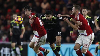 Chelsea's Diego Costa in action with Middlesbrough's Calum Chambers and Marten de Roon. Lee Smith / Reuters