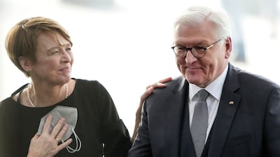 German President Frank-Walter Steinmeier is congratulated by his wife Elke Buedenbender. AP