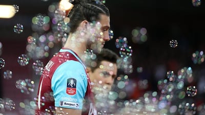 Andy Carroll of West Ham United walks out for the FA Cup, sixth round replay between West Ham United and Manchester United at the Boleyn Ground on April 13, 2016 in London, England. (Photo by Paul Gilham/Getty Images)