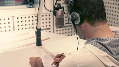 Murad, a presenter on Al Ghad FM, prepares to read a news bulletins that will be broadcast into the city of Mosul, which is under the control of ISIL. The radio station is a valuable source of information to residents almost completely cut off from the outside world. Florian Neuhof for The National