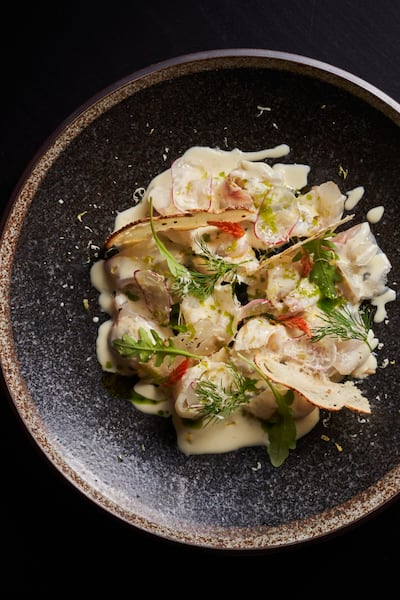 The levrek, which is thinly sliced raw sea bass with mustard, apple and radish. Photo: Ruya