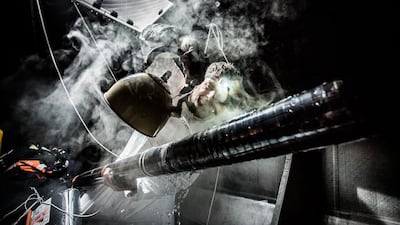 Brian Carlin, Ireland, The Guardian: Robert Salthouse fixing the outrigger/reaching strut during the Volvo Ocean Race. This image was a finalist candidate in the photography category of the inaugural Sport Media Pearl Awards, which is managed by the International Sports Press Association (AIPS) and hosted by Abu Dhabi Media, publishers of The National.
