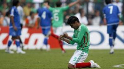Mexico's Carlos Salcido celebrates after his teammate Cuauhtemoc Blanco scores against El Salvador.