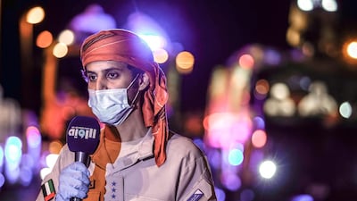Captain Mohammed Al Ahbabi of Abu Dhabi Police speaks to a camera crew from Al Roeya, The National's Arabic-language sister newspaper