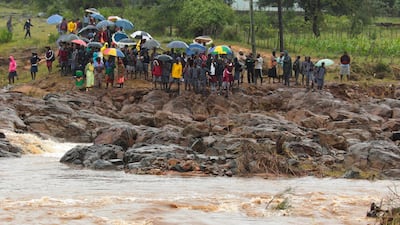 Schoolchildren are stranded across a collapsed bridge in Chimanimani, southeast of Harare, Zimbabwe. AP Photo